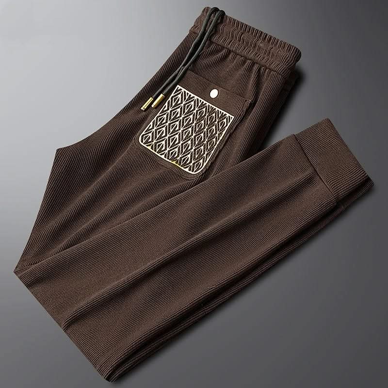 GRACE | Tapered trousers with ribbed texture