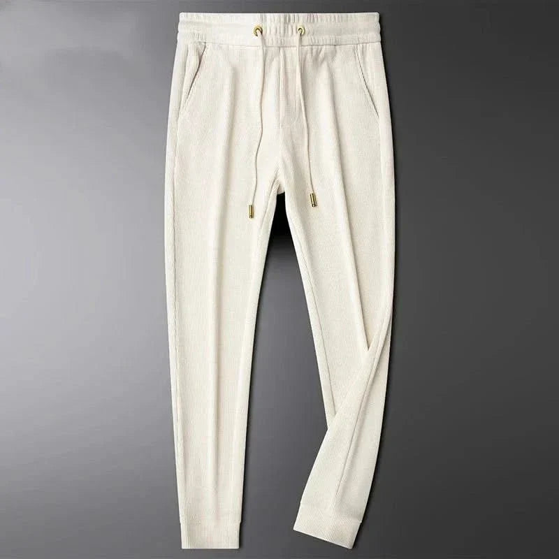 GRACE | Tapered trousers with ribbed texture