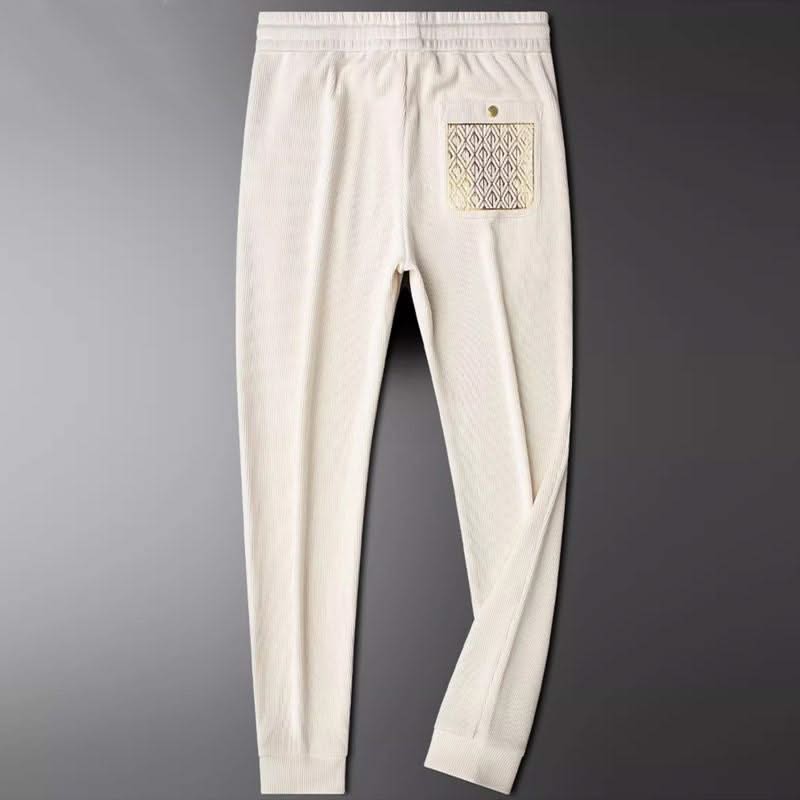 GRACE | Tapered trousers with ribbed texture