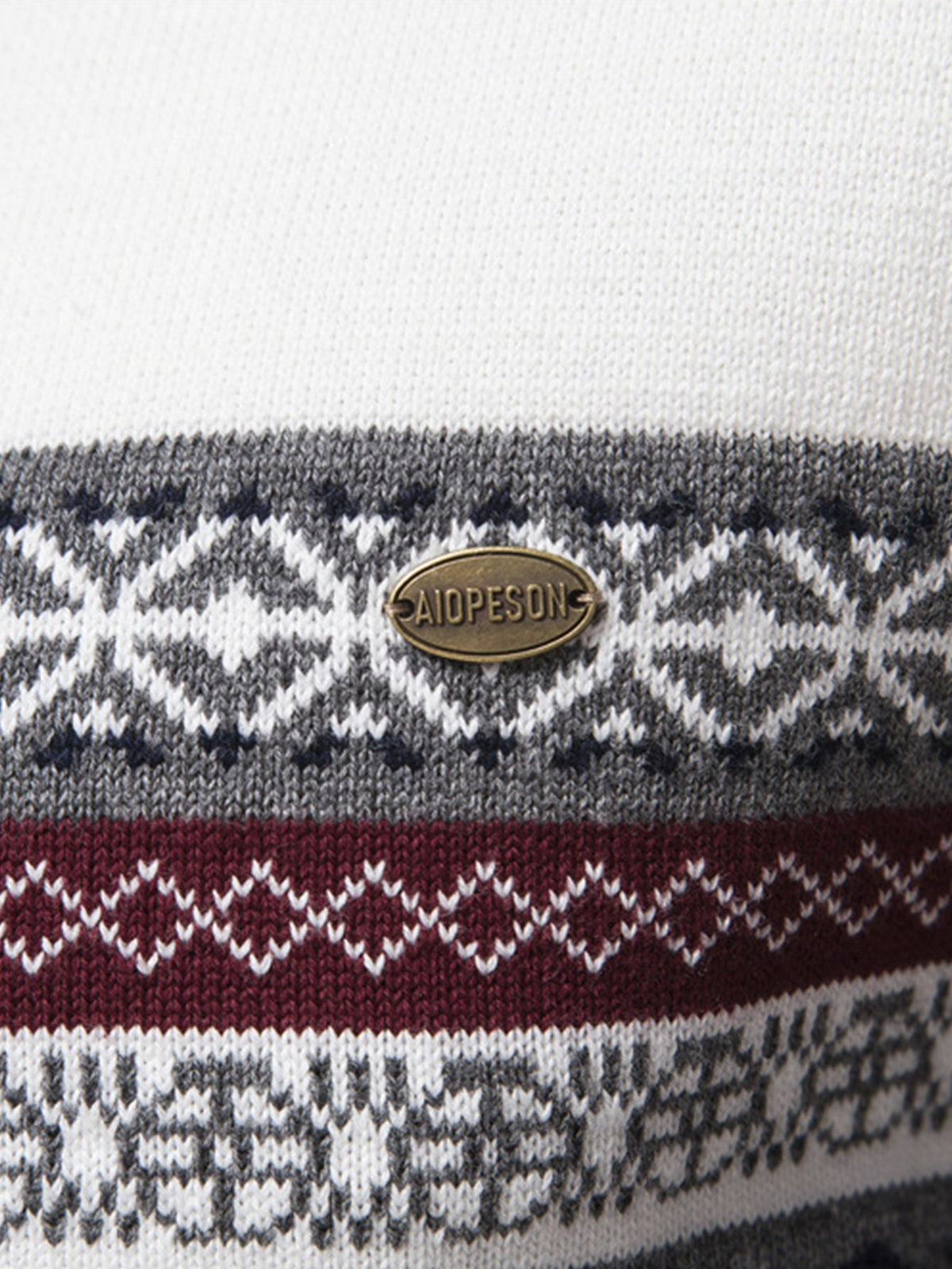 JEMIMA | Geometric jacquard sweater with zip collar