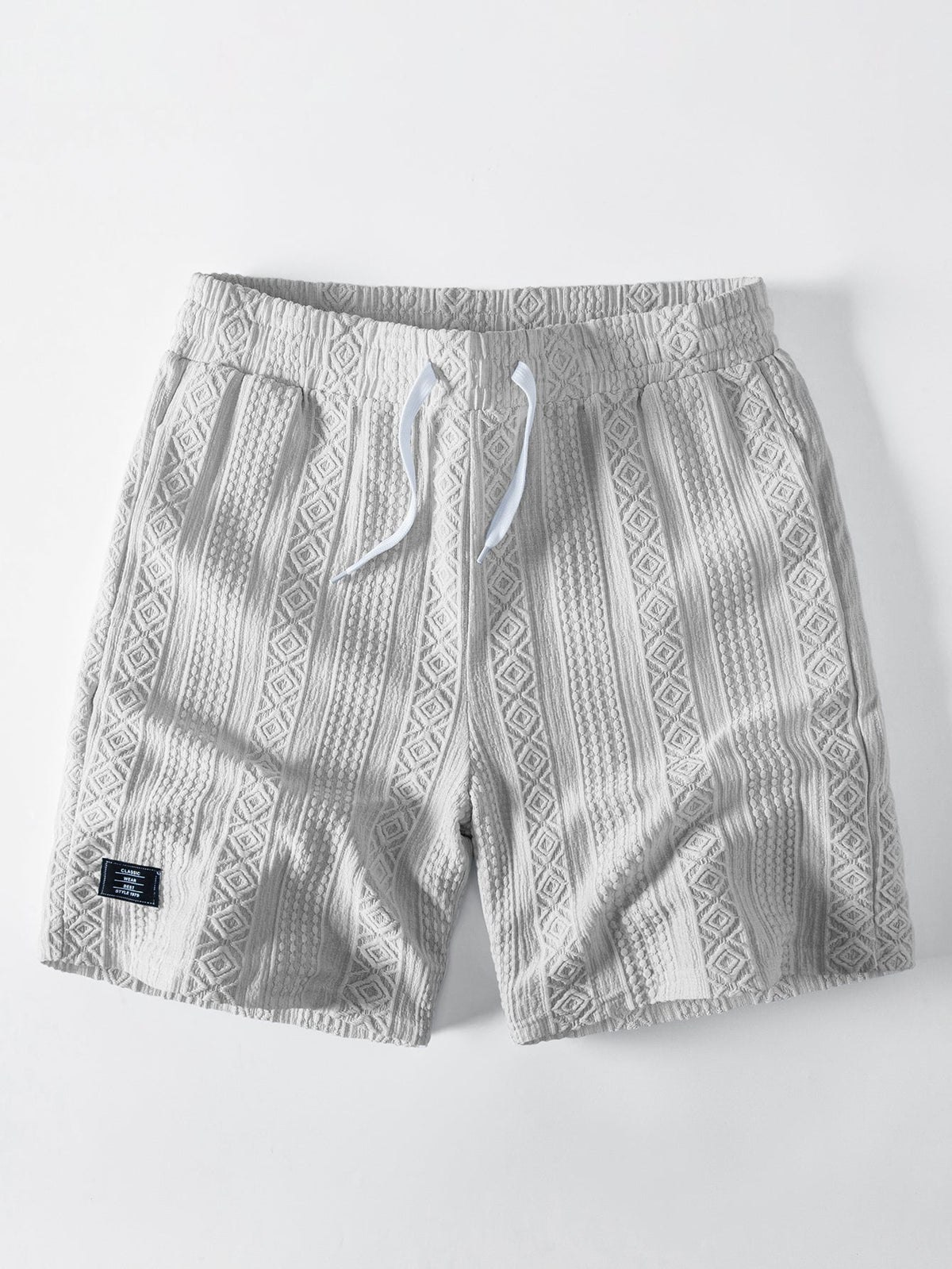 THEO | Drawstring shorts with jacquard pattern