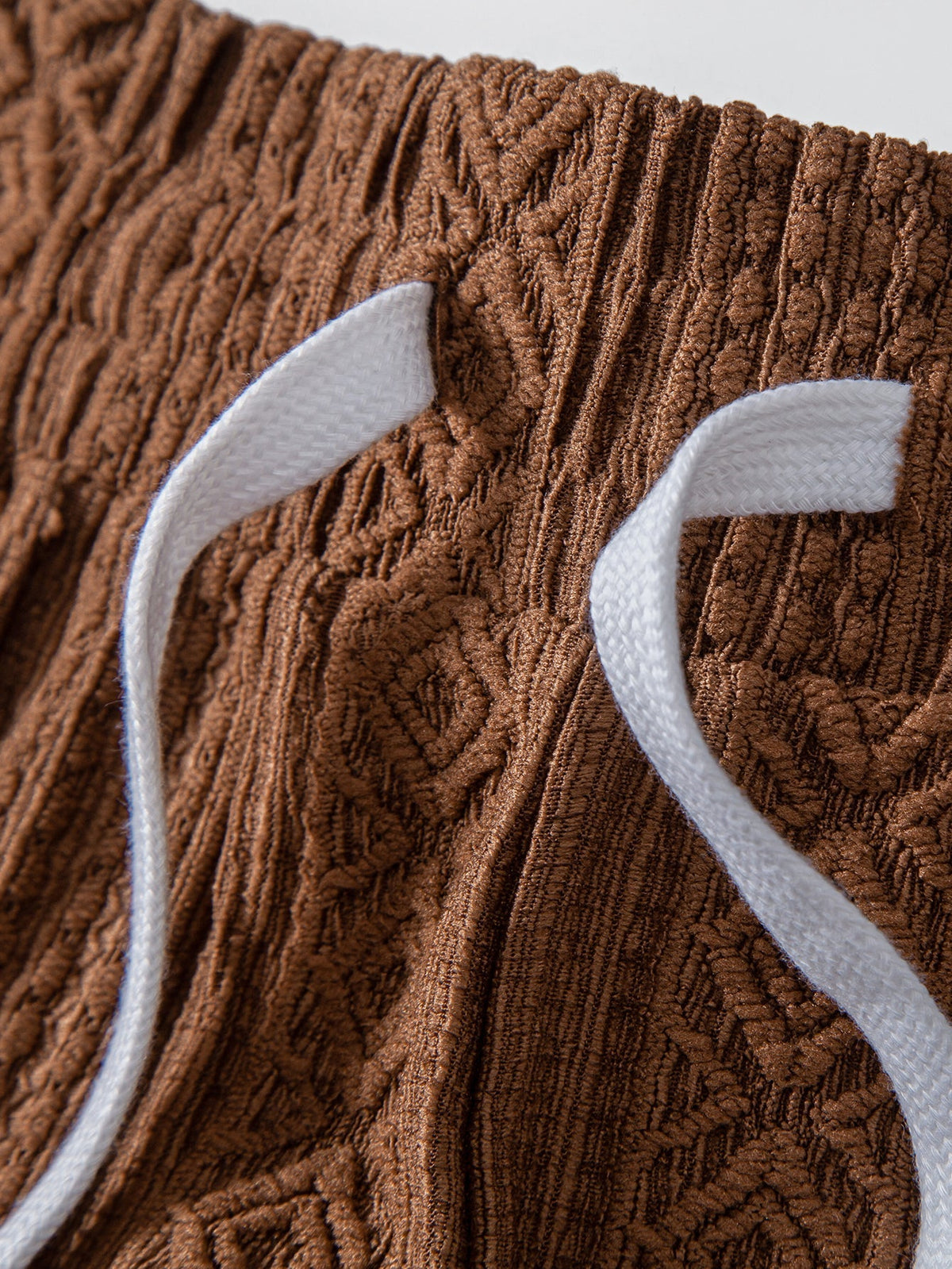 THEO | Drawstring shorts with jacquard pattern