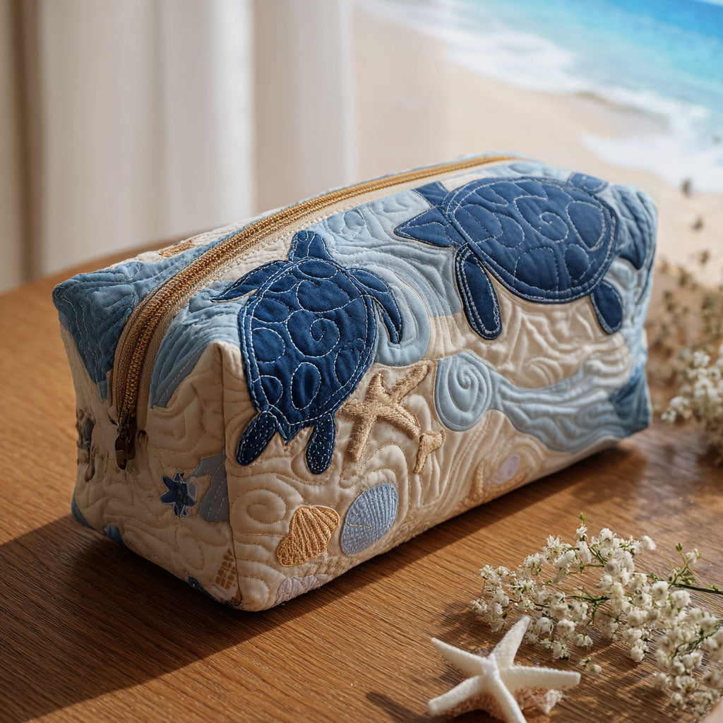 FREYA | Quilted cosmetic bag with shell print