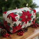 POPPY | Quilted cosmetic bag with festive print